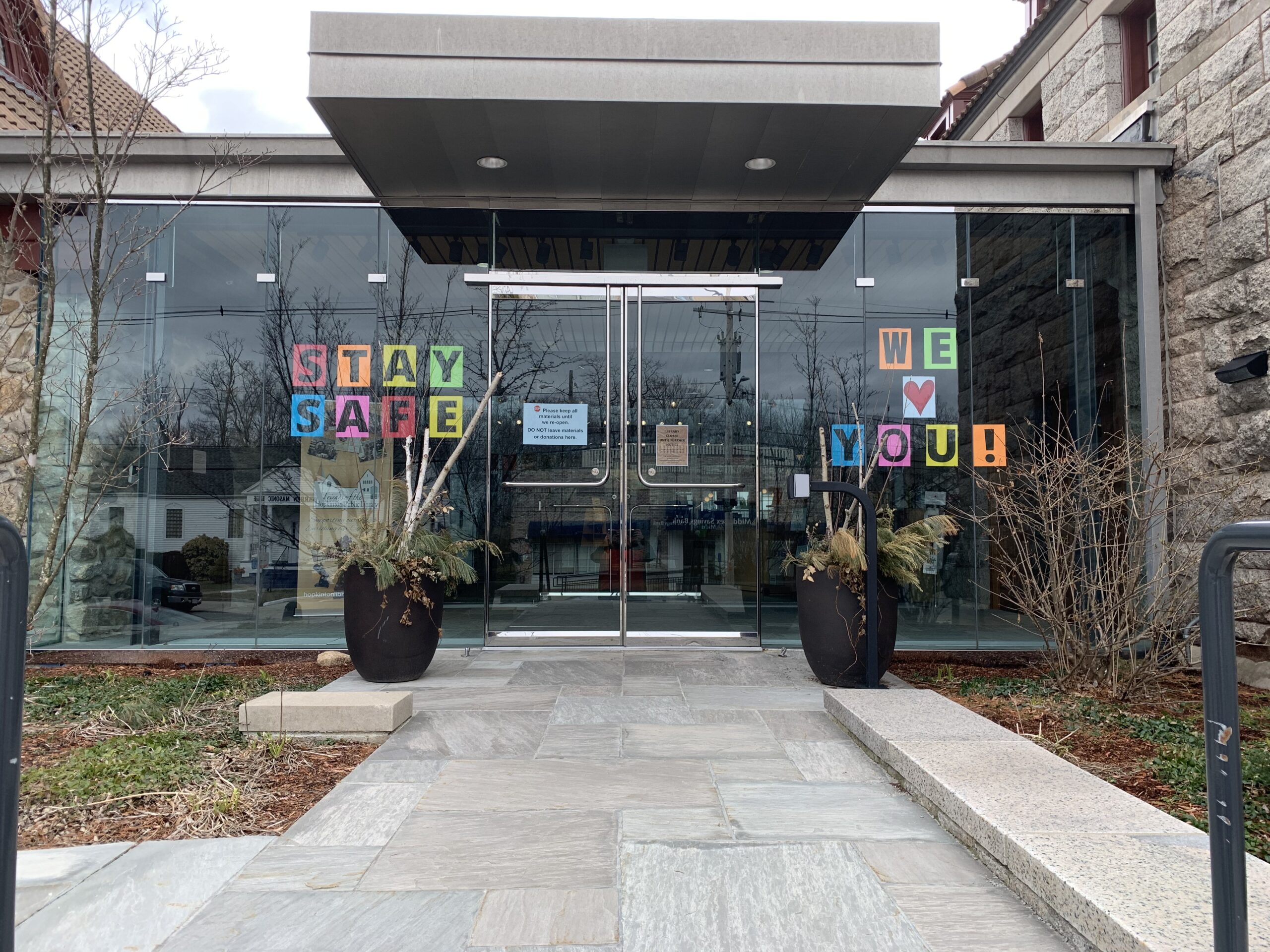 Hopkinton Public Library signs show support for town