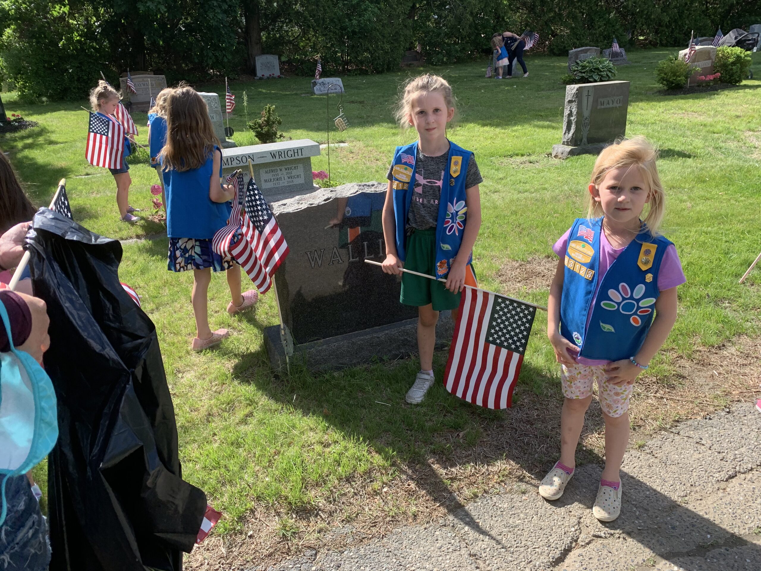 Photos Scouts place flags at cemeteries for Memorial Day Hopkinton