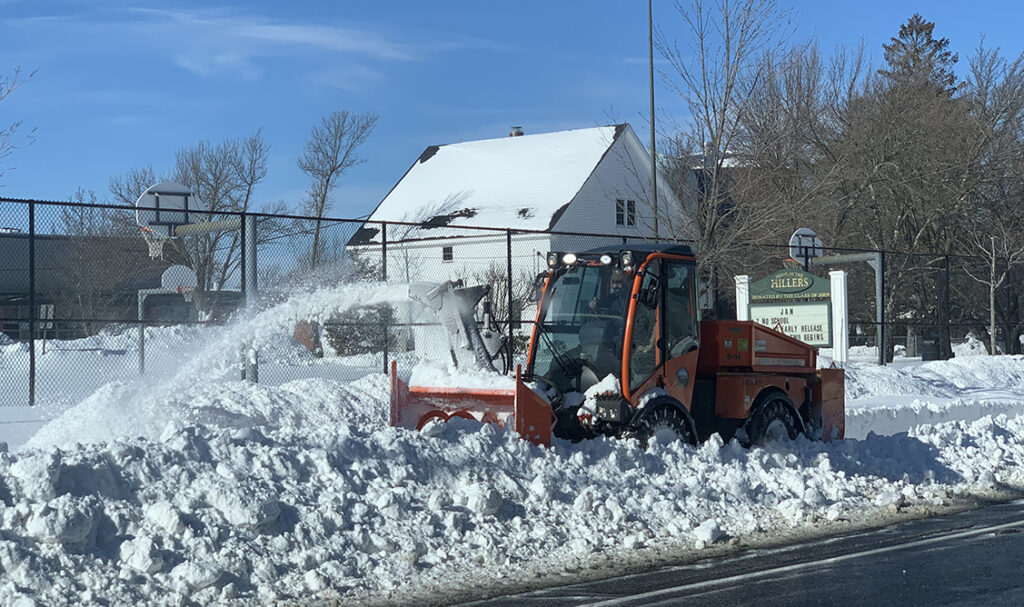 Sidewalk plow