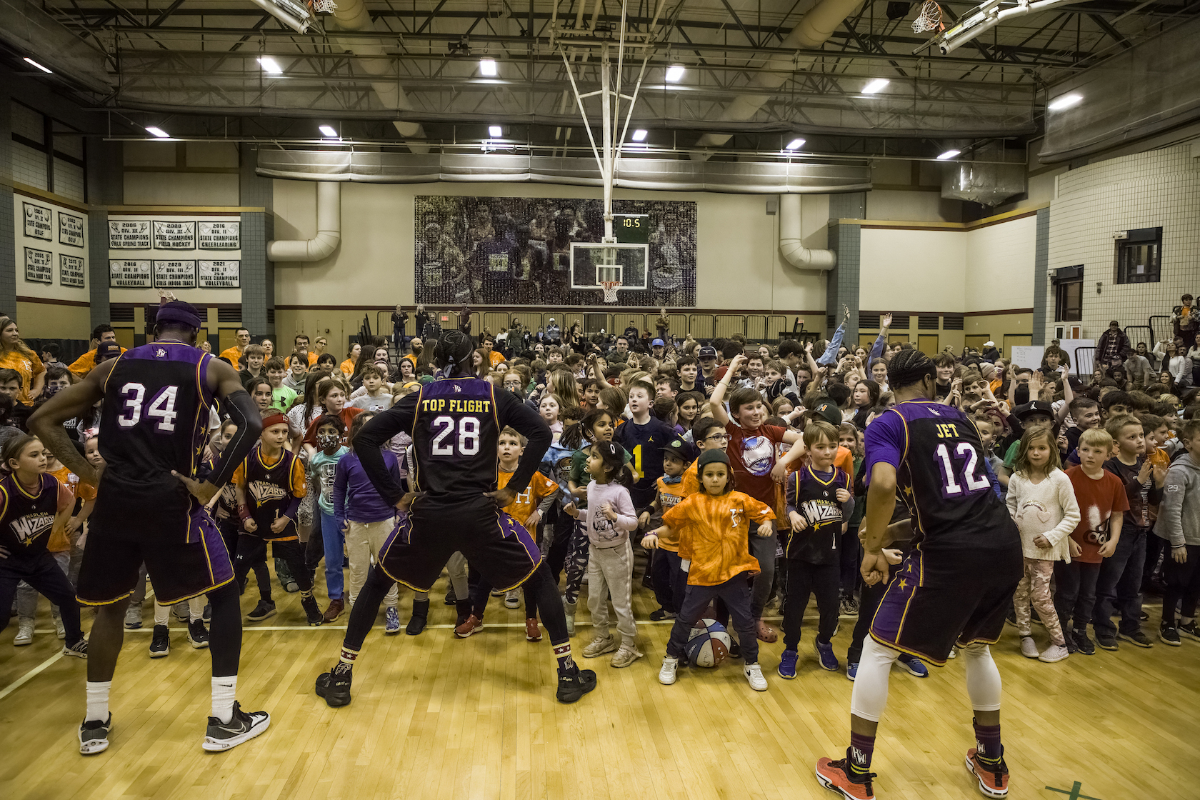 Photos: Harlem Wizards vs. Hopkinton school staff basketball game