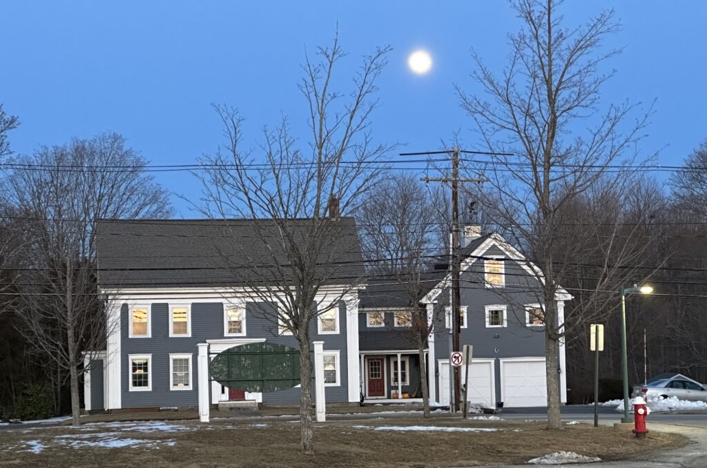 Moon over house