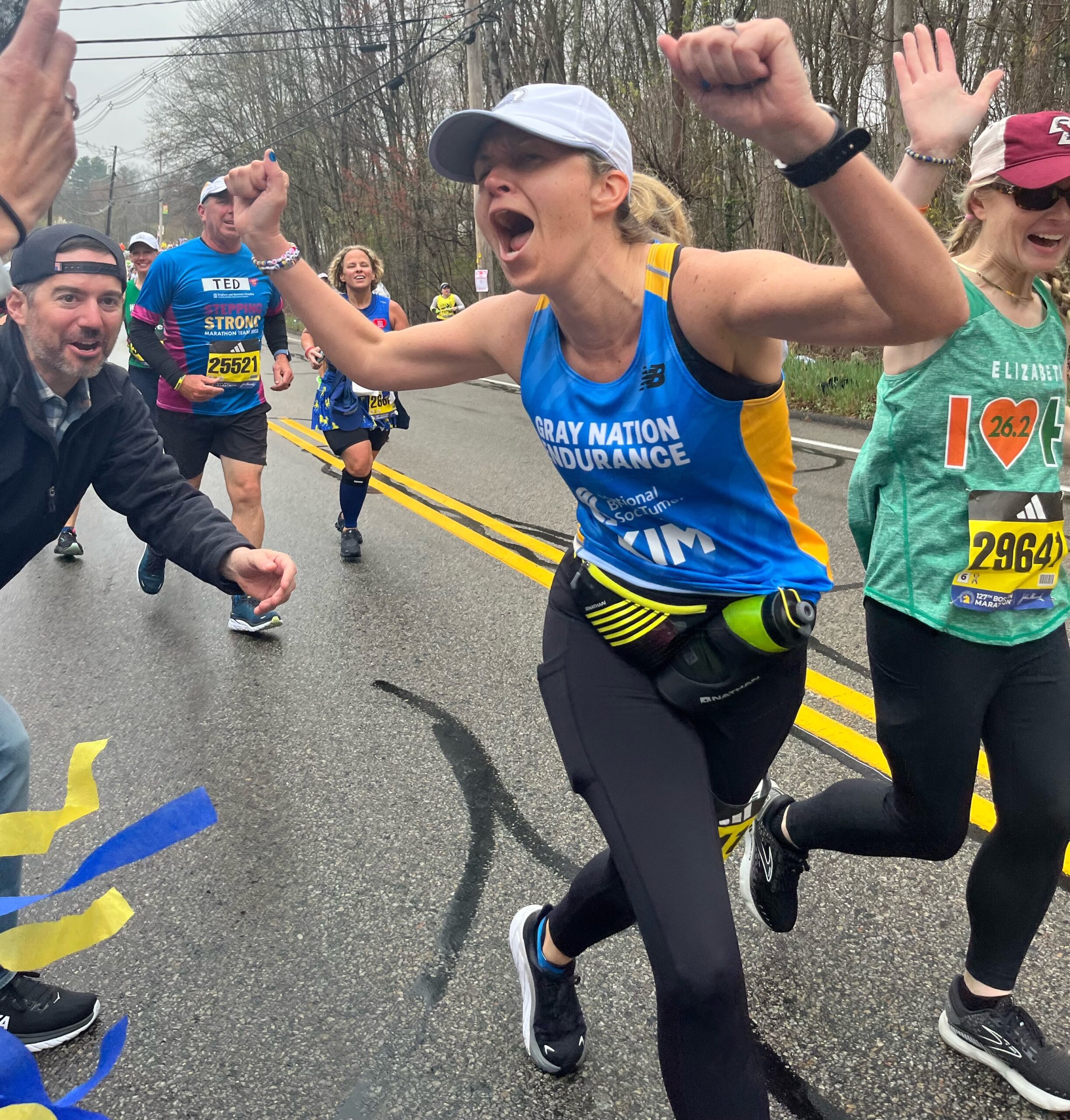 Local Boston Marathon runners revel in crowd support in Hopkinton, along course