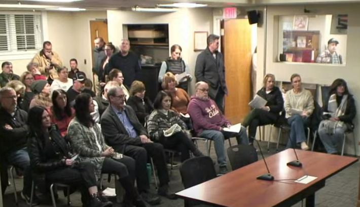 Residents rally in support of Sgt. Brennan, rebuke town officials at Select Board meeting