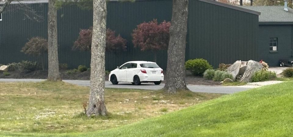 Police seek driver who took car onto golf course