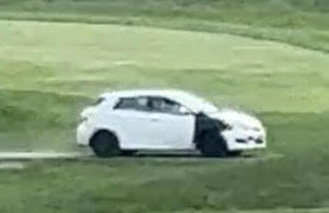 Car on golf course
