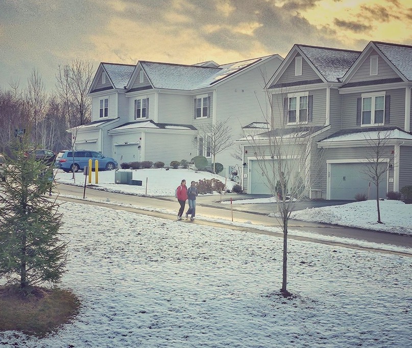 snow-covered houses at Legacy Farms